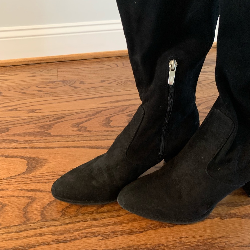 Marc Fisher black knee-high sock boots.